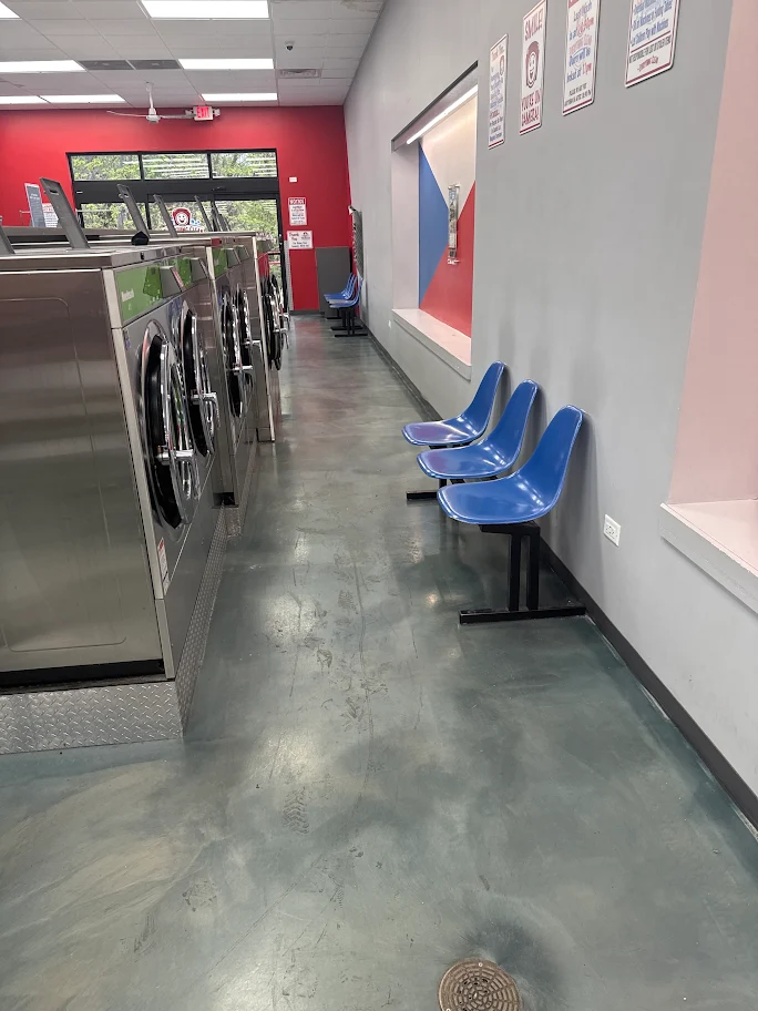 Commercial floor before restoration: dull, scuffed concrete
