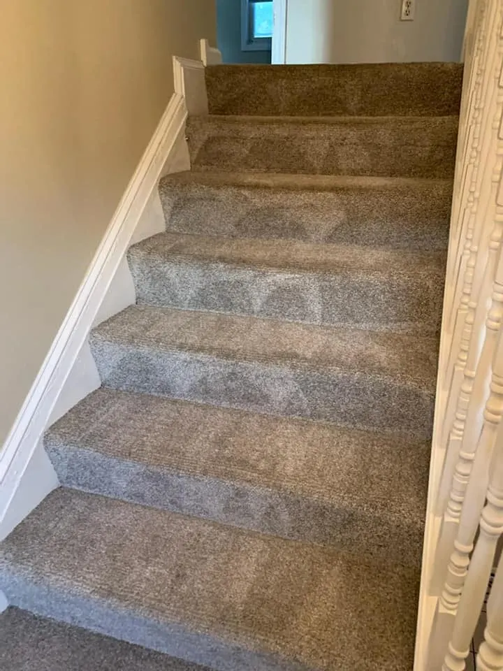 Staircase carpet after a detail pass, pile lifted and uniform